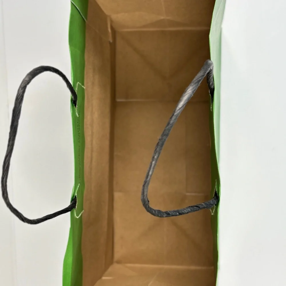 Kate Spade Pink box and green gift bag.